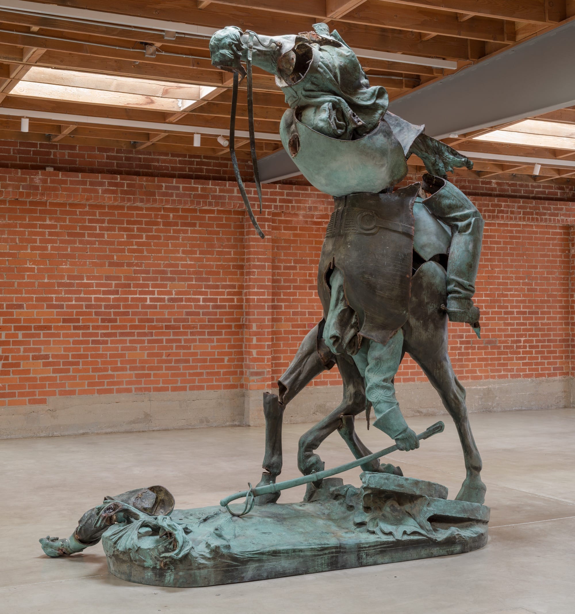 a bronze sculpture by Kara Walker made from reconfigured pieces of a former Confederate monument