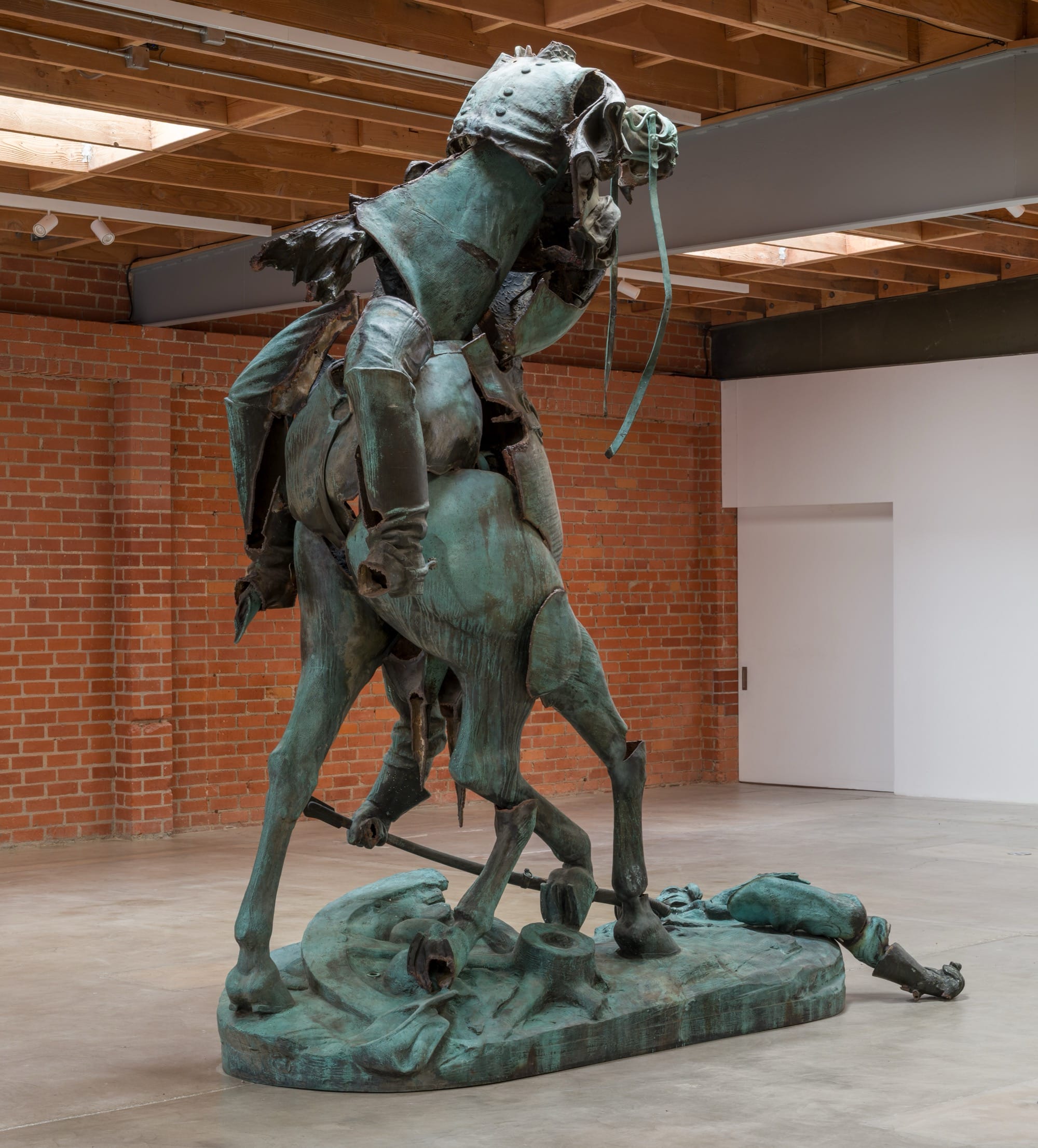 a bronze sculpture by Kara Walker made from reconfigured pieces of a former Confederate monument